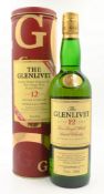 The Glenlivet Pure Single Malt Whisky aged 12 years, with girt tag & promo.