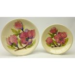 Moorcroft Magnolia pattern plate, D26cm and side plate, D22cm,