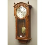 20th century walnut cased arched top wall clock with glazed door,