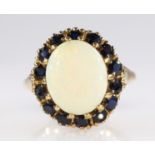 Gold opal and sapphire cluster ring hallmarked 9ct Condition Report <a