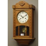 20th century wall clock with glazed door,