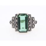 Marcasite stepped silver ring set with a green stone stamped 925 Condition Report