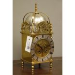 17th century style brass lantern clock, engraved dial with silvered chapter ring,