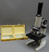 20th century Konus Microscope, turret with three objectives, rack & pinion coarse and fine adjust,