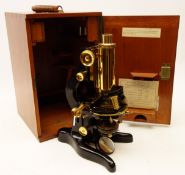 20th century black japanned & lacquered brass monocular 'Patna' Microscope, outfit 16603, stamped W.