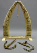 Early 19th century walrus ivory watch stand, the two supports Scrimshaw worked with flower vases,
