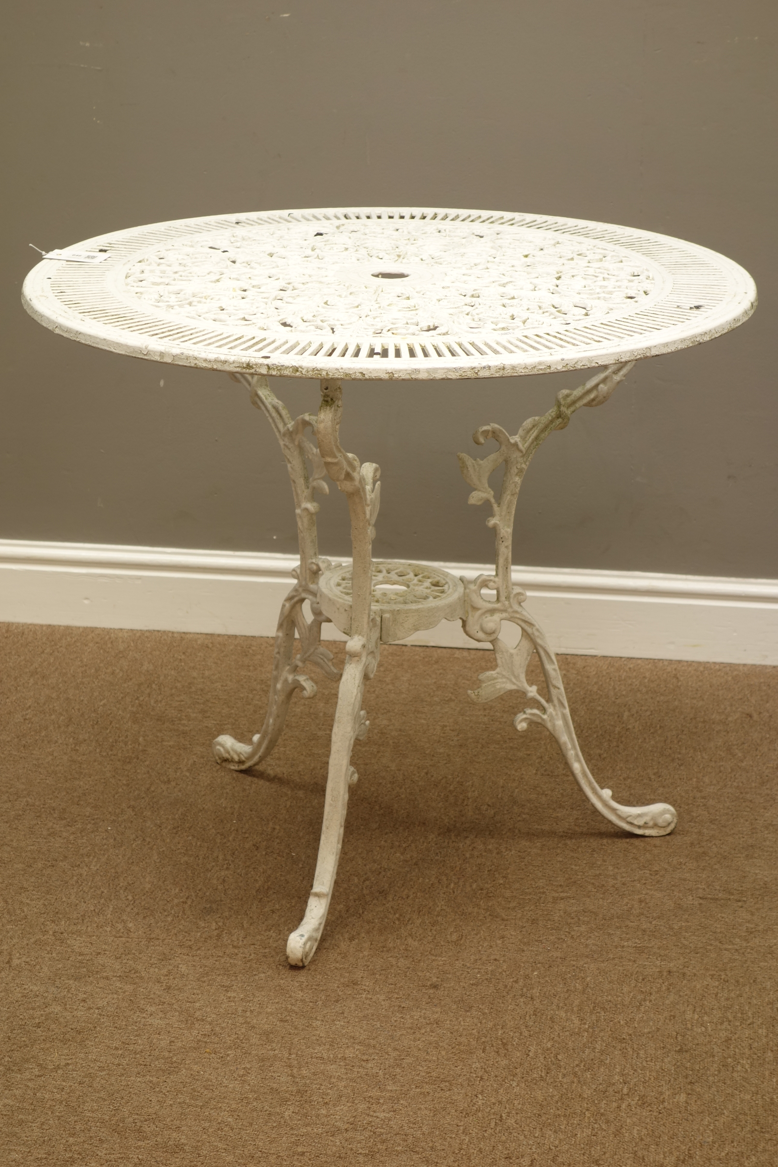 Ornate white painted cast alloy circular garden table, D80cm,