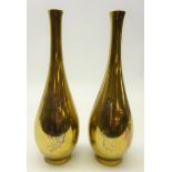 Pair Meiji period polished bronze vases, each bearing the mark of the Nogawa, of bottle form,