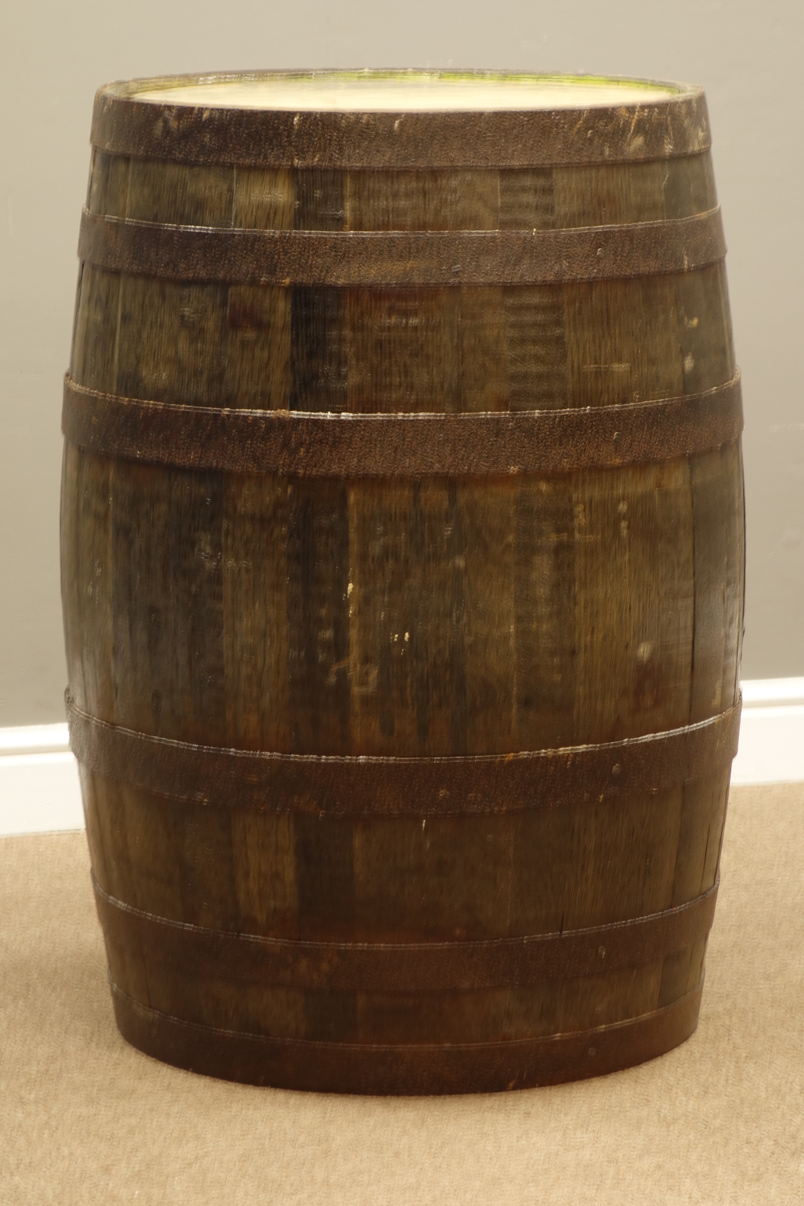 Polished oak and metal bound barrel, H90cm,