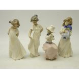 Four Nao figurines; two girls in white dresses,