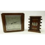 Early 20th century oak perpetual desk calendar, H16.5cm and an Art Deco oak framed barometer (2)