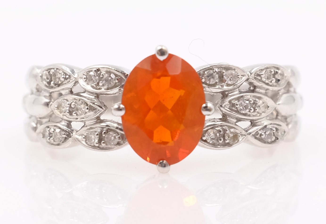 White gold fire opal and diamond ring hallmarked 9ct Condition Report Approx 3.