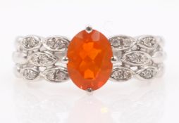 White gold fire opal and diamond ring hallmarked 9ct Condition Report Approx 3.