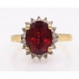 9ct gold garnet and diamond cluster ring hallmarked Condition Report Approx 3gm size