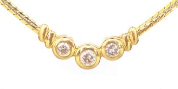 Gold bezel set round brilliant cut diamond trilogy necklace stamped 14kt diamonds = 0.