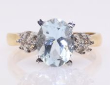 9ct gold three stone aquamarine and diamond ring hallmarked Condition Report approx