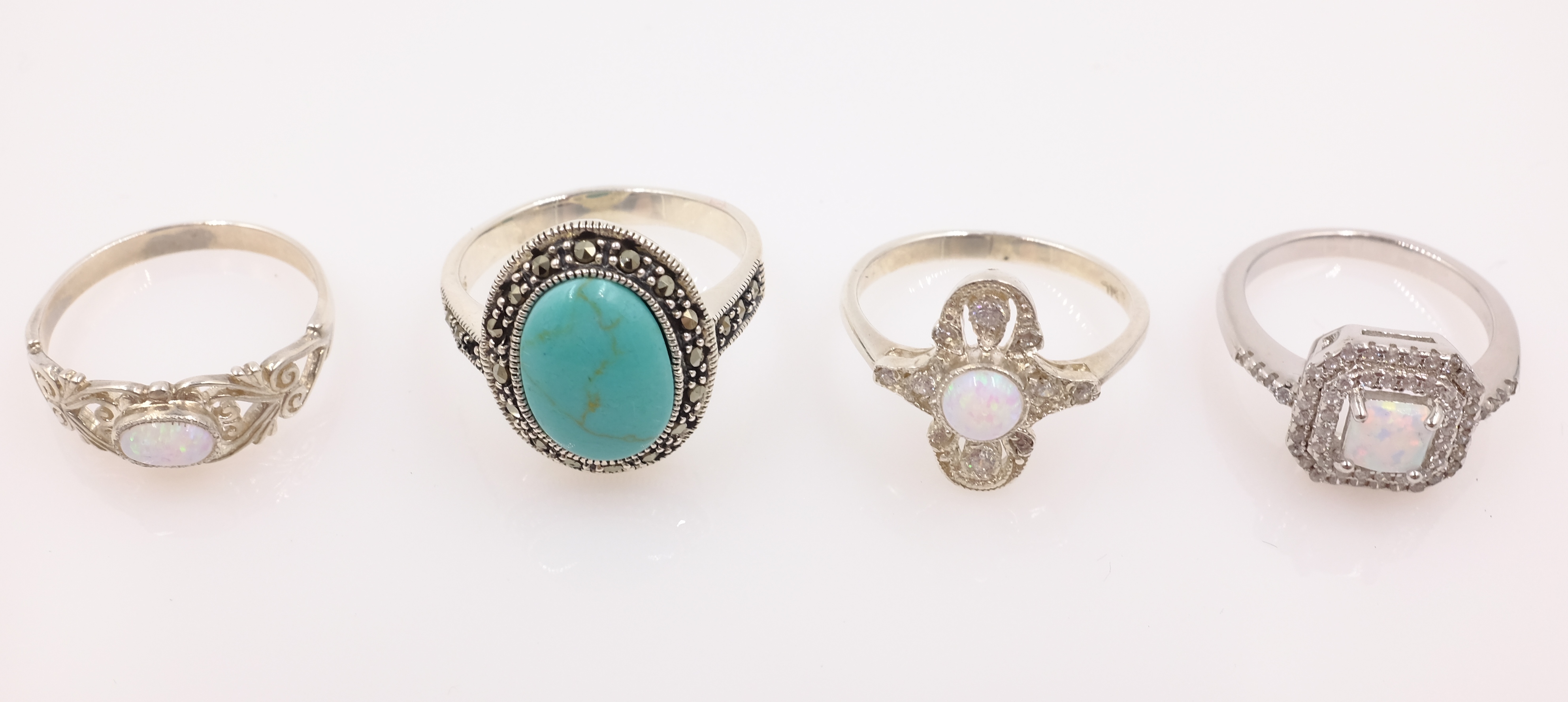 Turquoise and marcasite silver ring and three opal and stone set rings stamped Condition - Image 2 of 2
