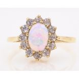 Opal and stone set gold ring hallmarked 9ct Condition Report approx 2gm size