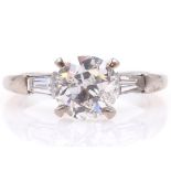18ct white gold brilliant cut diamond ring with baguette diamond shoulders central diamond approx 0.