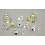 Swarovski crystal swan, teddy bear, monkey, dog and one other,