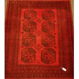 Persian Bokhara red ground rug, 187cm x 147cm Condition Report <a href='//www.