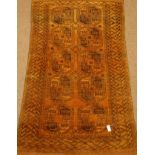Persian Bokhara gold ground rug, traditional Gul design,
