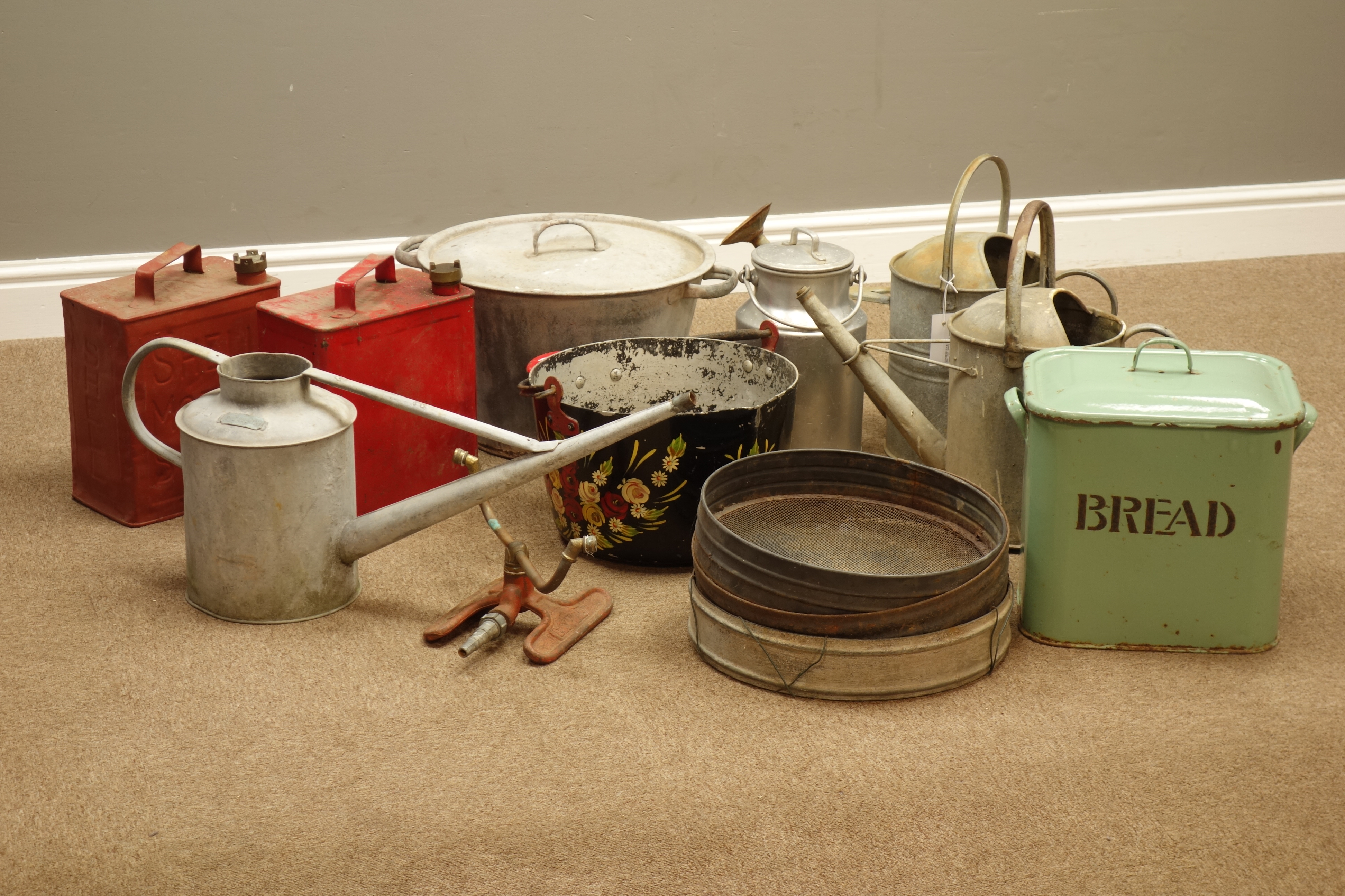 Three metal watering cans including 'Beldray', enamel bread bin, vintage Shell containers,