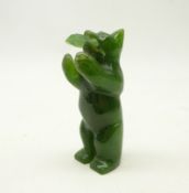 20th century Inuit carved jade polar bear with salmon,