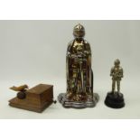Table lighter and musical box in the form of a Knight in armour, similar companion stand,