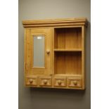 Waxed pine wall hanging cabinet, mirror glazed door, four small drawers, W67cm,