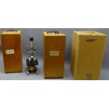 Two Meiji-Labex Model TM-1A grey japanned Microscopes with rack & pinion coarse & fine adjustment,