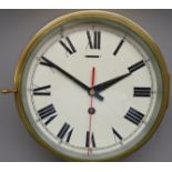 20th century brass cased bulkhead Ship's Clock, circular Roman dial with centre sweep seconds,