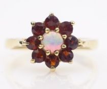 Opal and garnet gold cluster ring hallmarked 9ct Condition Report 2.
