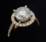 18ct gold diamond halo ring, the central diamond 3.72 carat, diamond surround 0.