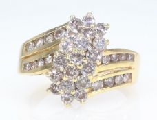 14ct gold diamond cluster cross-over ring stamped 14KP diamonds approx 1 carat Condition