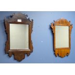 Two walnut framed Chippendale style wall mirrors,