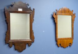 Two walnut framed Chippendale style wall mirrors,