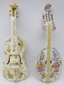Two 19th century Faience wall pockets in the form of musical instruments; violin & lute,