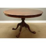 Georgian style reproduction mahogany centre table, circular top with carved moulded edge,