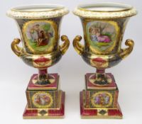Pair of late 19th Century Vienna style porcelain campana urn shaped vase on stands,