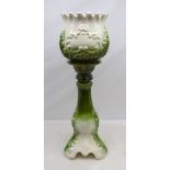 Victorian jardiniere on stand with moulded scroll design,