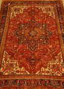 Persian Hamadan red ground rug carpet, with large central medallion on floral field,