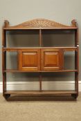 Edwardian walnut wall cupboard, arched cresting above six compartments and two panel doors, W74cm,