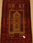 Old Baluchi red ground prayer rug, 144cm x 94cm Condition Report <a href='//www.