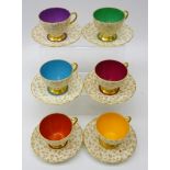 Set of six Art Deco Foley China Harlequin coffee cups and saucers (12) Condition Report