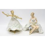 Two German Wallendorf figurines, woman seated with fan & a dancing woman,