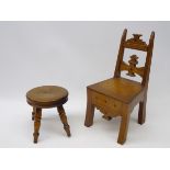 Early 20th century ecclesiastical style oak dolls chair with parquetry inlay,