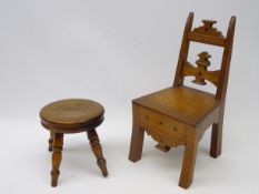 Early 20th century ecclesiastical style oak dolls chair with parquetry inlay,