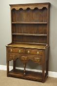 Small 17th century style oak dresser with plate rack, two drawers and three small spice drawers,