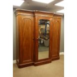 Victorian mahogany triple wardrobe, centre mirror glazed door, two arched panelled doors,